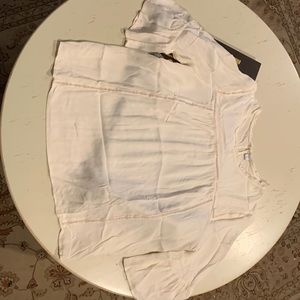 Fun off white shirt.